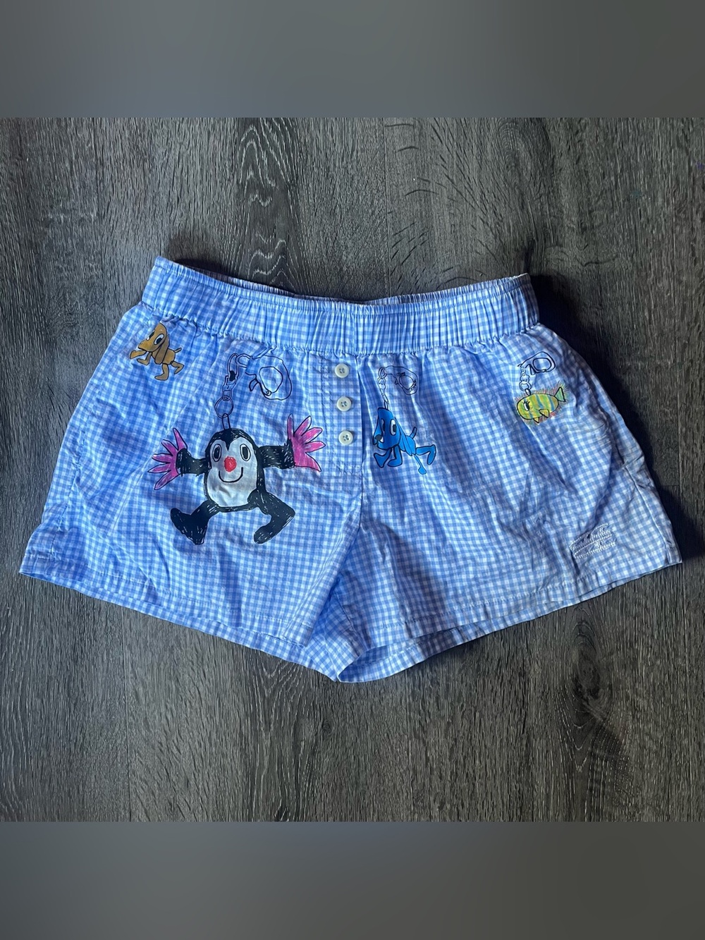 Crying Center blue and white gingham shorts